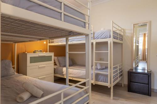 Postel nebo postele na pokoji v ubytování Villa Mar del Plata 8 bed apartment