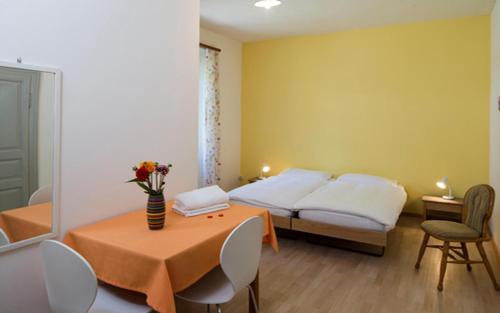 Cama o camas de una habitación en Hotel Garni Maggia