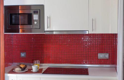 Kuchyňa alebo kuchynka v ubytovaní Apartamento Puerta del Arenal - Kainga Homes