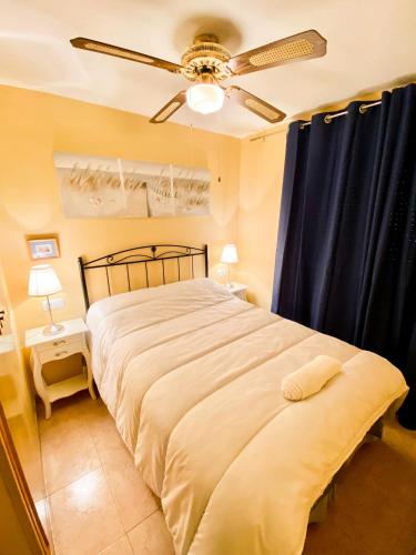 Postel nebo postele na pokoji v ubytování RESIDENCIAL PORTOFINO V OROPESA REF 001