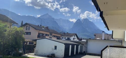 a view of a town with mountains in the background at Ferienhaus Butterfly 2 in Garmisch-Partenkirchen