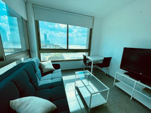 TV a/nebo společenská místnost v ubytování C Tower Apartments