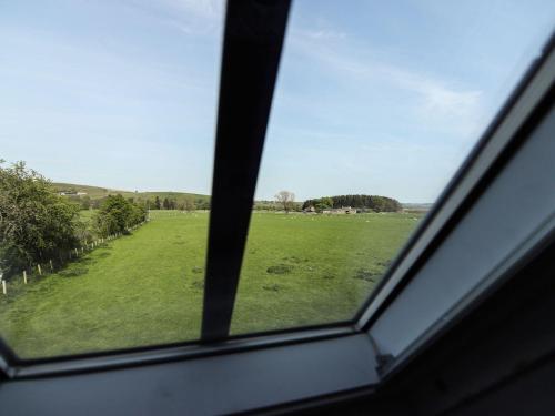 a view of a field from a window at Greystead Institute in Hexham