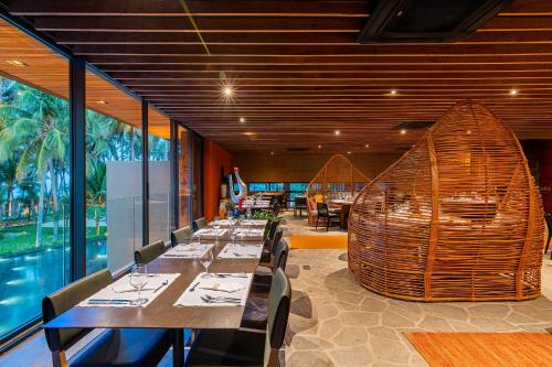 Um restaurante ou outro lugar para comer em Carmel Taíba Exclusive Resort
