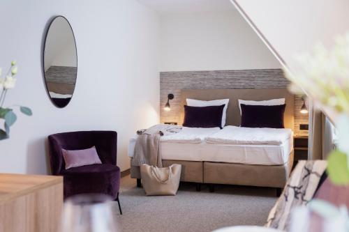 Postel nebo postele na pokoji v ubytování maakt Hotel