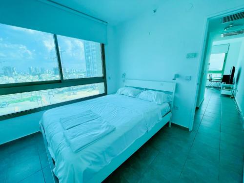 Postel nebo postele na pokoji v ubytování C Tower Apartments