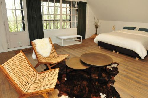 Cama o camas de una habitación en B&B 't Burreken