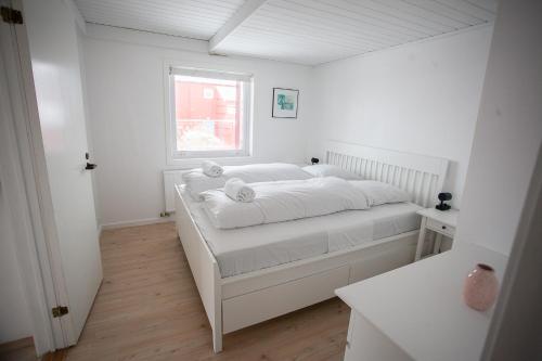 Un ou plusieurs lits dans un hébergement de l'établissement Cozy / Nordic House / Baker / Svartifossur
