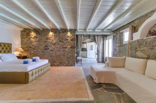 Ένα ή περισσότερα κρεβάτια σε δωμάτιο στο Seablue Villas