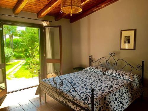 Postel nebo postele na pokoji v ubytování Casa Magnolia