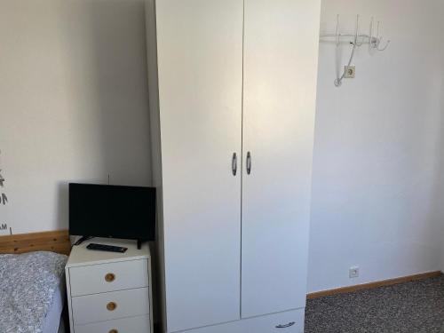 TV a/nebo společenská místnost v ubytování Bigus