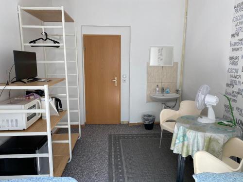TV a/nebo společenská místnost v ubytování Bigus