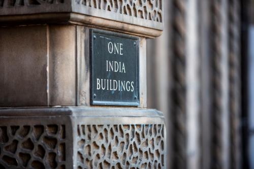 a sign that says one india buildings on a monument at Virgin Hotels Edinburgh in Edinburgh