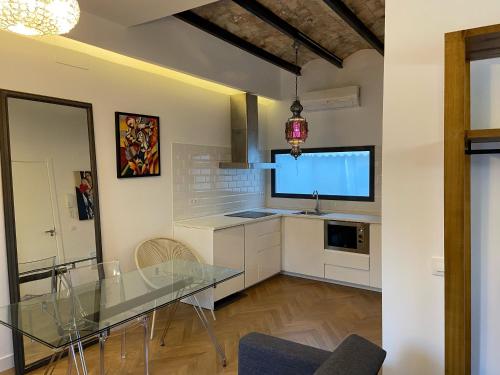 A kitchen or kitchenette at CASA NAIA Santa Rufina 7