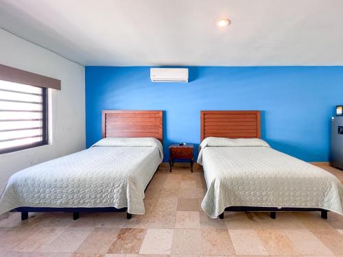 Ein Bett oder Betten in einem Zimmer der Unterkunft Loft Sabalo - Pet Friendly