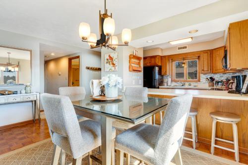 a kitchen with a dining table and chairs at Chetola Cardinal 201 in Blowing Rock