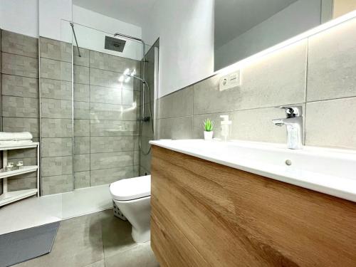 Koupelna v ubytování Precioso apartamento con piscina a 50m de la playa