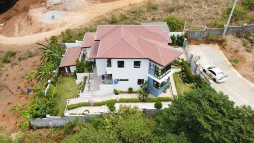 an aerial view of a house with a red roof at Luxury Villa at Mariveles Bataan Philippines Ph in Mariveles