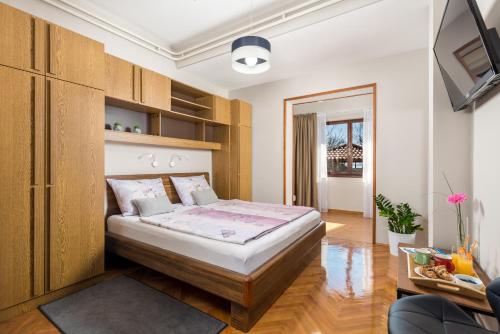 Säng eller sängar i ett rum på Guest House Dešković