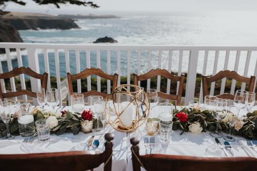 a dining room table set up for a wedding at Agate Cove Inn in Mendocino