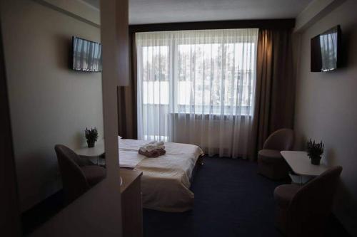 TV a/nebo společenská místnost v ubytování Amber Studio