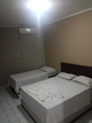 Katil atau katil-katil dalam bilik di Eldorado Inn