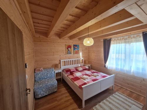 Giường trong phòng chung tại Panorama Tatry Chalets