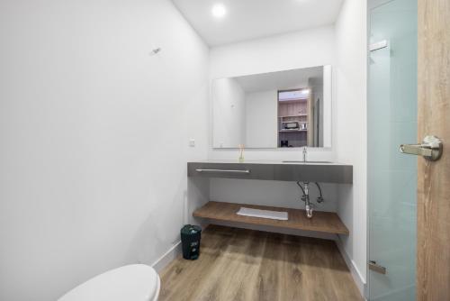 Ein Badezimmer in der Unterkunft Apartamentos Go Living & Suites by HOUSY HOST