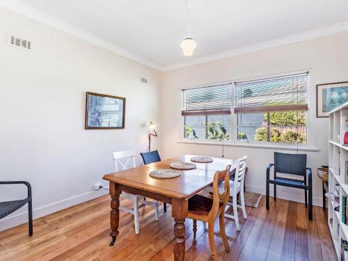 a dining room with a table and chairs at 40 Campbell in Port Fairy