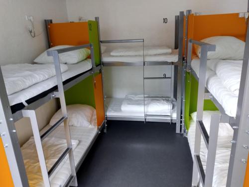 a group of bunk beds in a dorm room at Sleep in Heaven in Copenhagen