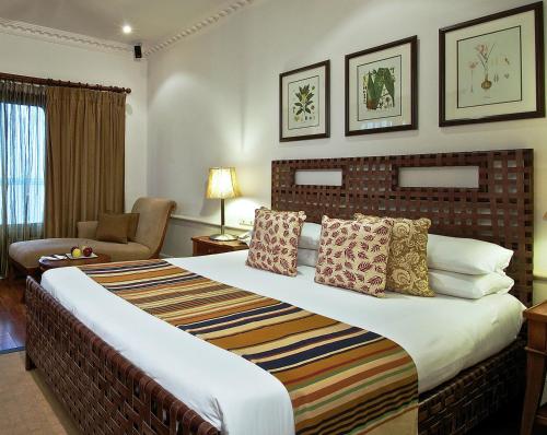 En eller flere senger på et rom på Taj Malabar Resort & Spa, Cochin.