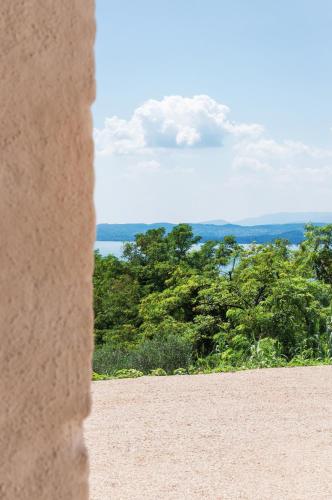 a view from a wall with trees in the background at Prati Palai in Bardolino