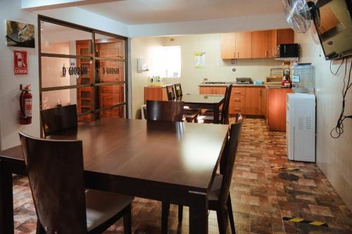 Kuchyň nebo kuchyňský kout v ubytování Di Giorgio Hostal