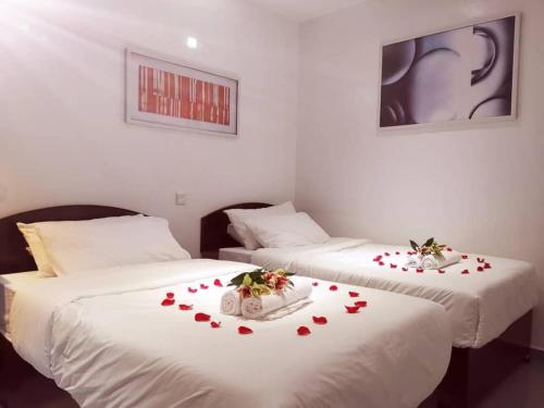 Postel nebo postele na pokoji v ubytování HOTEL MIRAMA 美麗華酒店