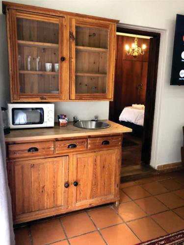 Kuchyň nebo kuchyňský kout v ubytování Beesdam Guesthouse