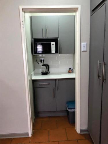 Kuchyň nebo kuchyňský kout v ubytování Beesdam Guesthouse