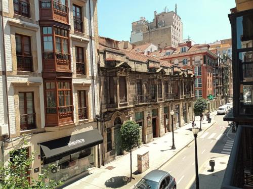 El barrio en el que está la casa de huéspedes o un barrio cercano