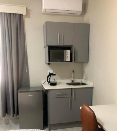 Kuchyň nebo kuchyňský kout v ubytování Beesdam Guesthouse