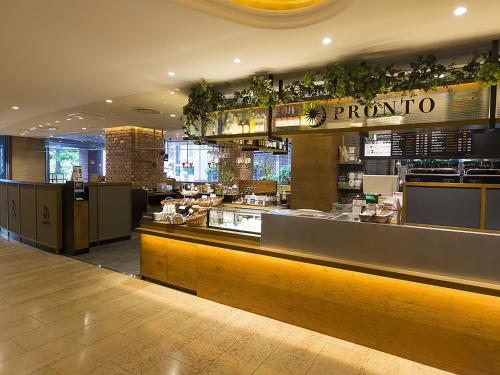 a dining area of a restaurant in a building at Shibuya Tobu Hotel in Tokyo