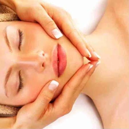 a woman with her hands on her face at La Viste - SPA-JACUZZI - MASSAGE- SAUNA - 4 SAISONS - Piscine Chauffée Toute l'année - Heated POOL - 800m City Centre in Nyons