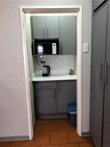 Kuchyň nebo kuchyňský kout v ubytování Beesdam Guesthouse