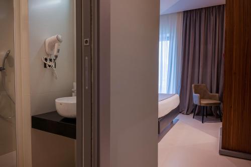 A bathroom at Best Western Hotel Ferrari