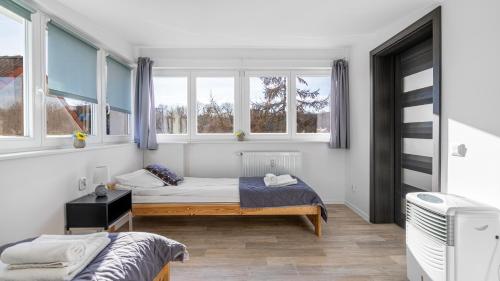 Posteľ alebo postele v izbe v ubytovaní Sunny - BillBerry Apartments