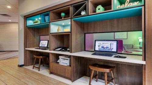 an office with a desk with a computer on it at Holiday Inn Staunton Conference Center by IHG in Staunton