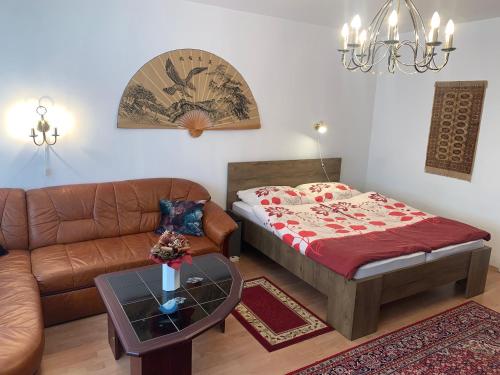 Posteľ alebo postele v izbe v ubytovaní HELENA Apartman