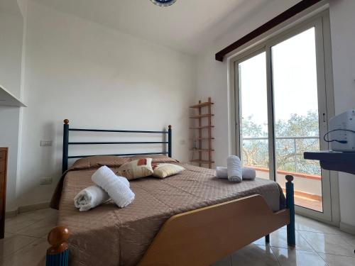 Posteľ alebo postele v izbe v ubytovaní La Terrazza