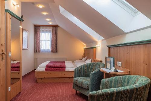 Posteľ alebo postele v izbe v ubytovaní Pension Oberjörg