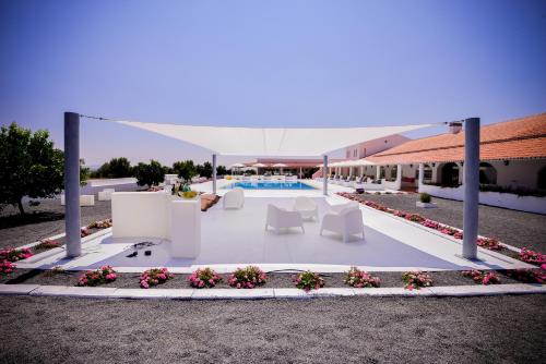 a rendering of the pool at a resort at Sesmarias Turismo Rural & SPA in Peroguarda