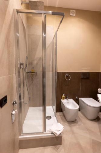 a bathroom with a shower and a toilet at Domus Aurelia in Rome