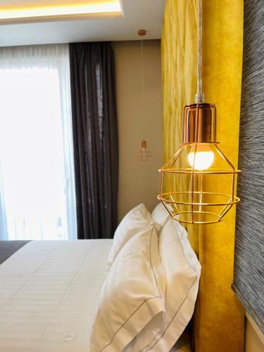 Katil atau katil-katil dalam bilik di Poda Boutique Hotel Ksamil
